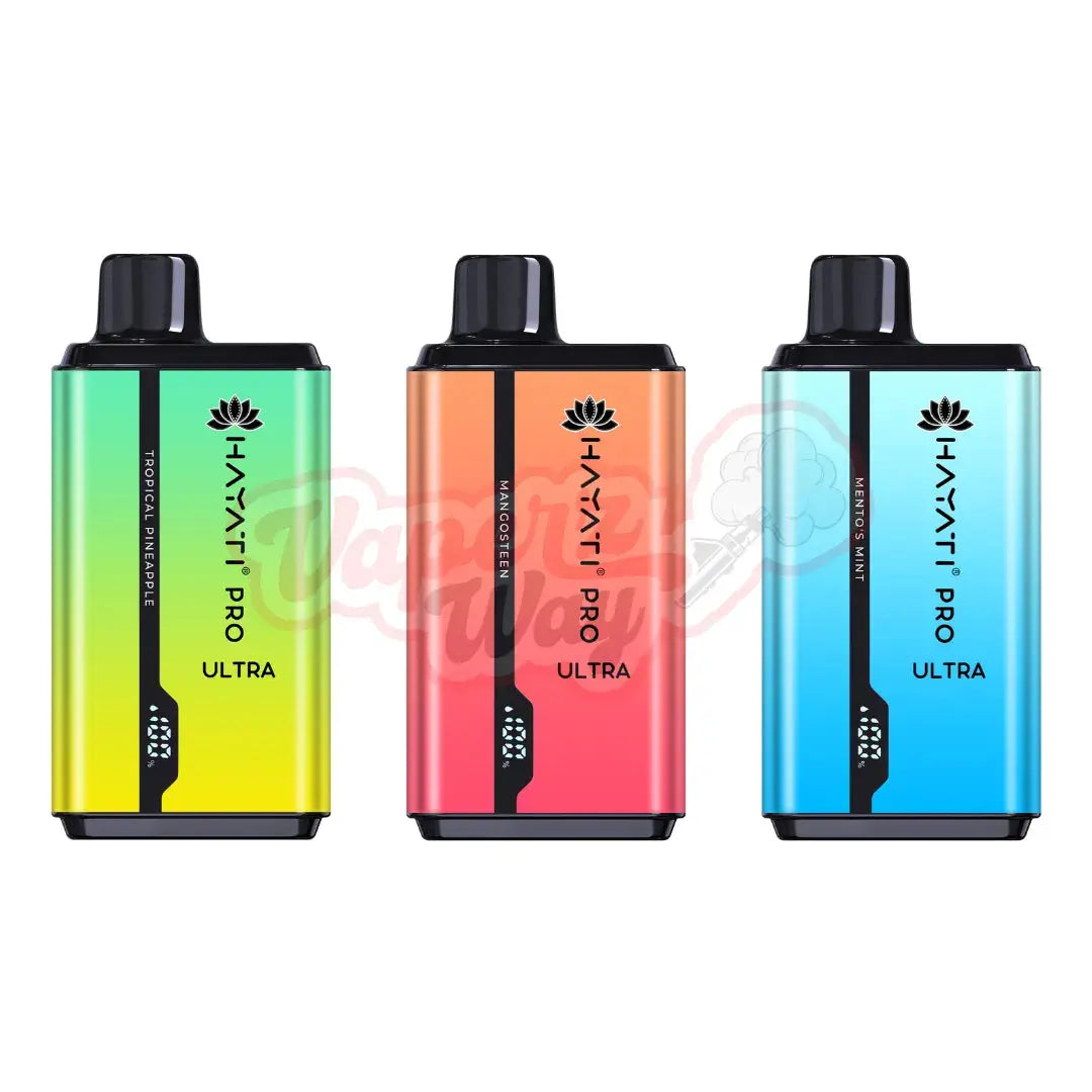 Three Hayati Pro Ultra 15000+ Puffs disposable vapes side by side in Tropical Pineapple, Mango Ice, and Mentos Mint flavors, each featuring a distinct vibrant color (green, orange, and blue) on the devices and packaging.